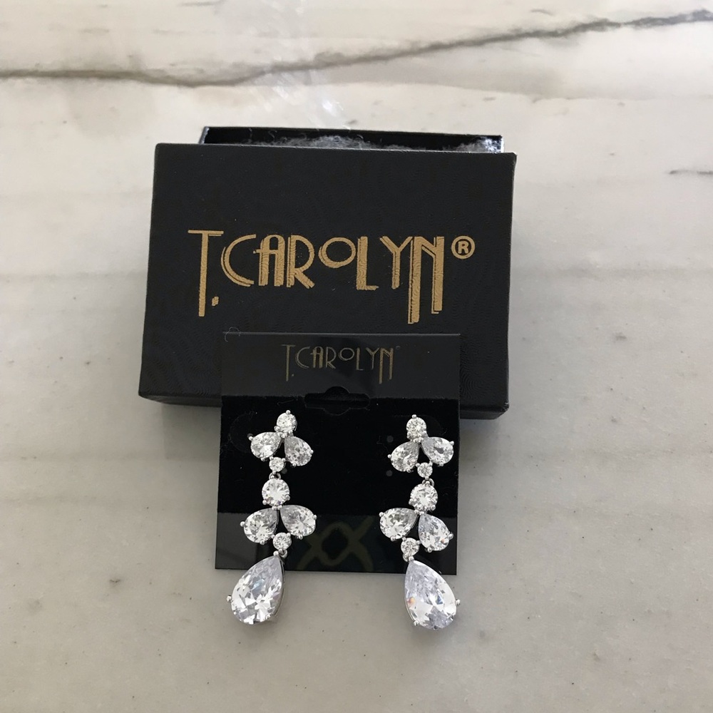 Earrings by T. Carolyn